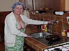 Elderly grandmother bares all on bed in explicit action.