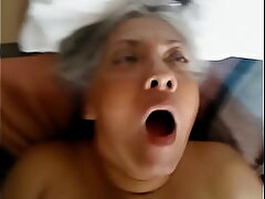 Old black lady gets pounded from all angles and fakes pleasure.